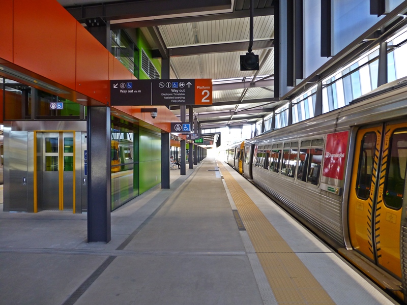 Train platforms are above ground level over the concourse