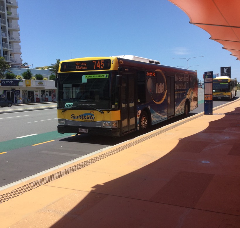 Arriving into Broadbeach Interchange is Surfside Buslines Volvo B7RLE with Bustech VST bodywork is 743 in all over advertising for 'theNet' on a route 745 to Nerang Station