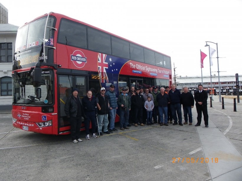 Members of the Tasmanian Bus &amp; Coach Society pose for a group shot