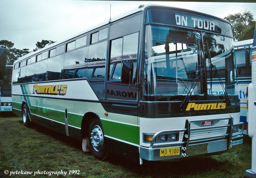 MO 9300
Purtills, Deniliquin (31) Hino RG197K/PMCA at AFL Park Waverley on a football charter in 1992.
Keywords: denairphoto hino_RG197K PMC