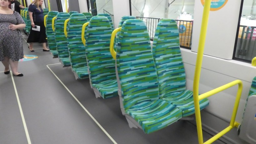 Saloon seats in the direction of travel.